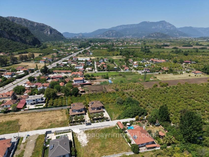 Land For Sale In Okçular, 1050M2, In The Village Residential Area.