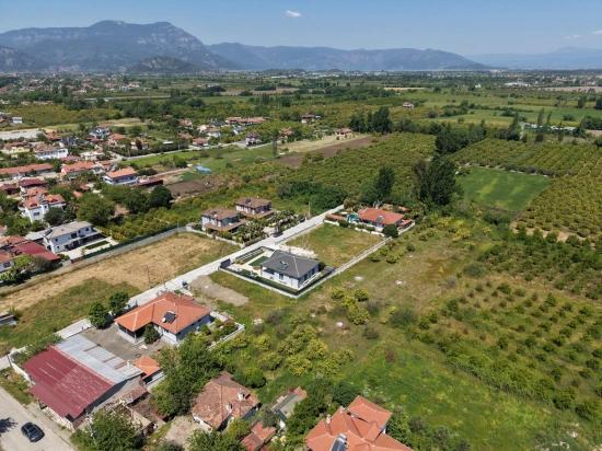 Land For Sale In Okçular, 1050m2, In The Village Residential Area.